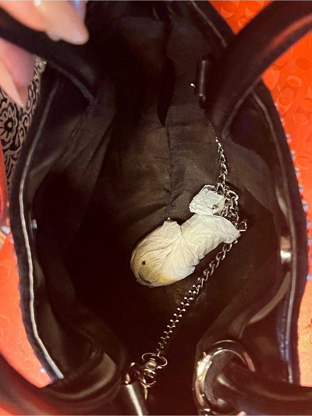 Fun and funky black and silver studded bucket bag. 80s and 90s studio 51 vibes!